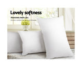 GISELLE SET OF 4 MEDIUM AND FIRM COTTON PILLOWS.